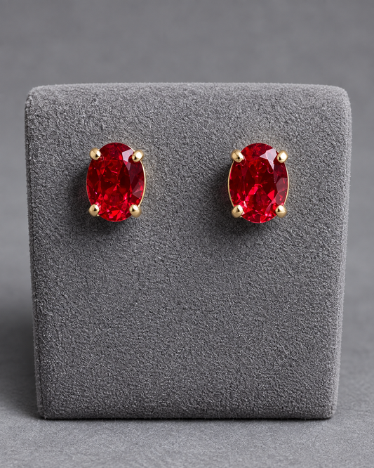 7x5mm Oval Hydrothermal Ruby Stud Earrings – 14K Yellow Gold