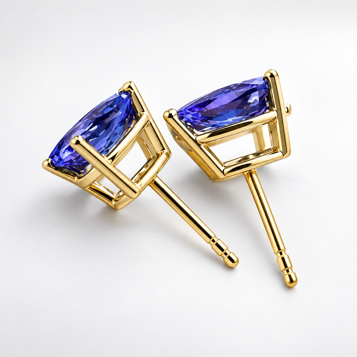 1.16 CTW Natural Tanzanite 7x5mm Pear Stud Earrings in 14K Yellow Gold | GSI Certified