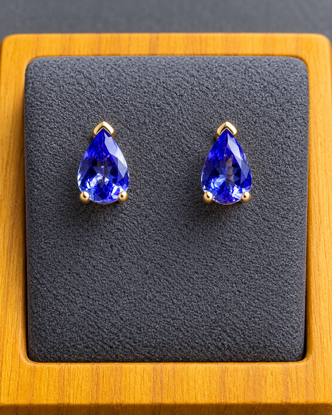 1.16 CTW Natural Tanzanite 7x5mm Pear Stud Earrings in 14K Yellow Gold | GSI Certified