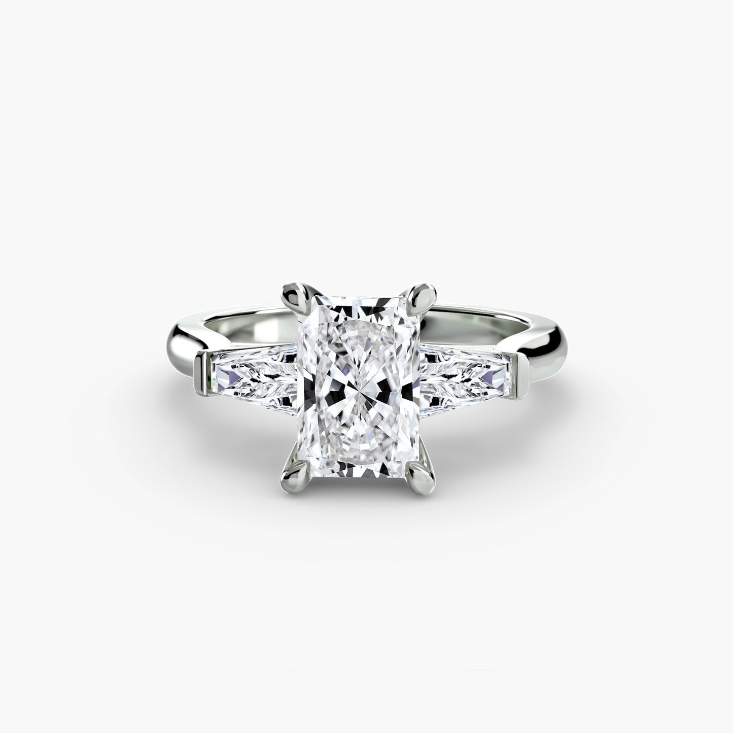 Radiant Three-Stone Diamond Ring with Tapered Baguette Side Diamonds