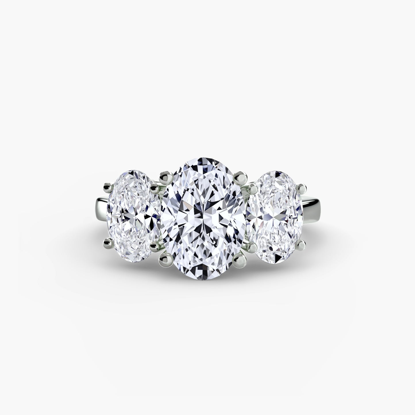 Oval Trilogy Engagement Ring