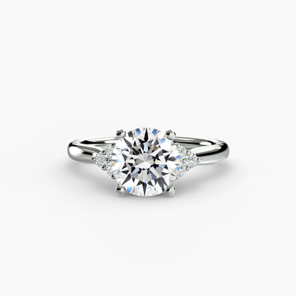 Solitaire Engagement Ring with Cluster Shoulders
